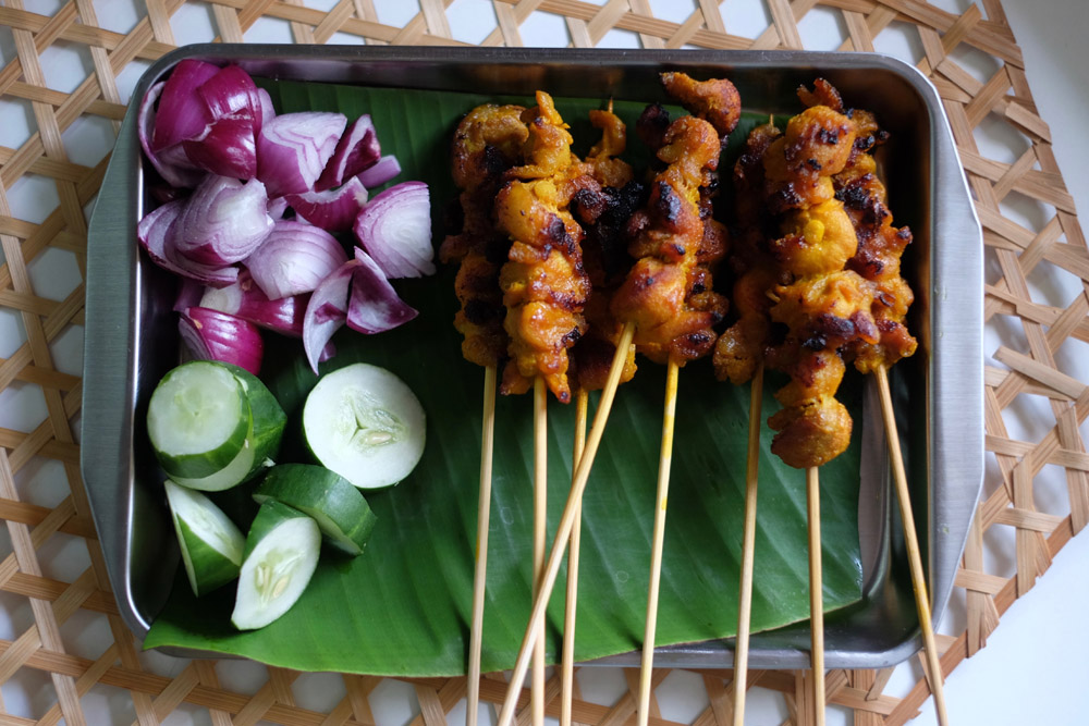 Kuih broadly means cakes and snacks eaten between meals which may include satay