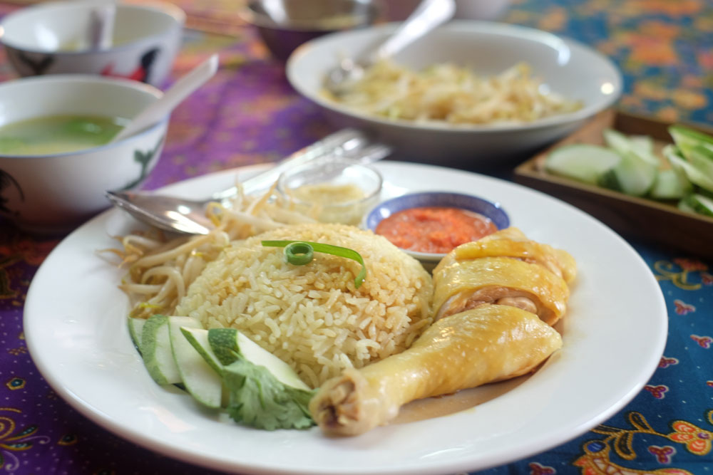 Enjoy your homemade Hainanese chicken rice with a local family